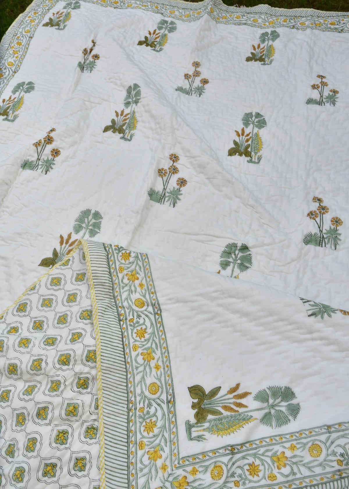 Green print quilt