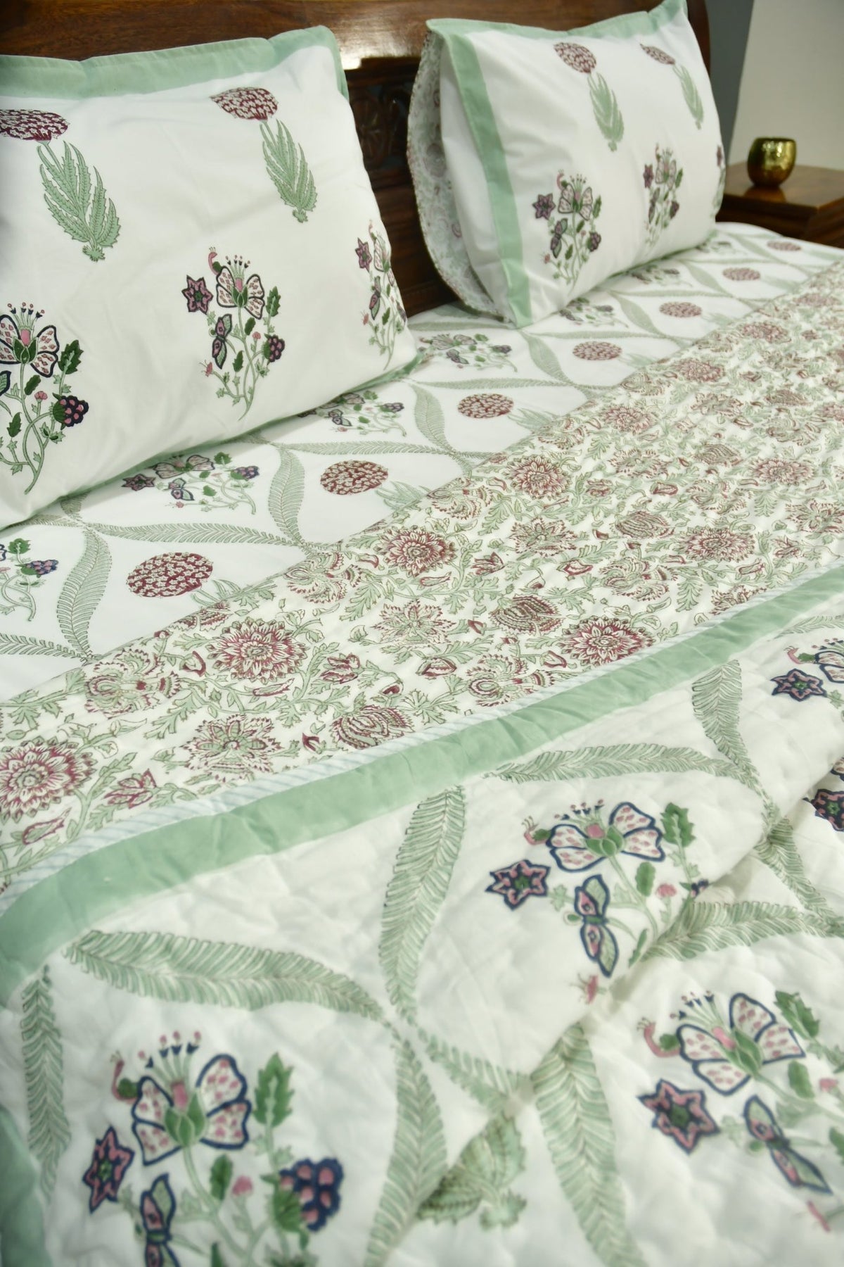 Green and white quilt