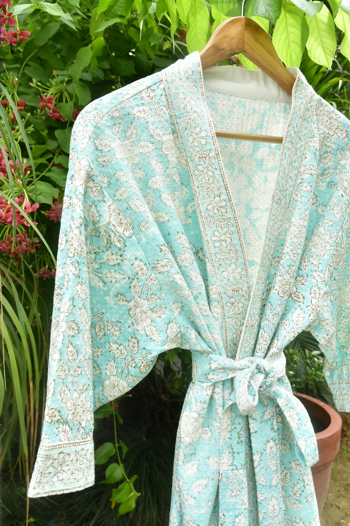 luxurious white and green bathrobe